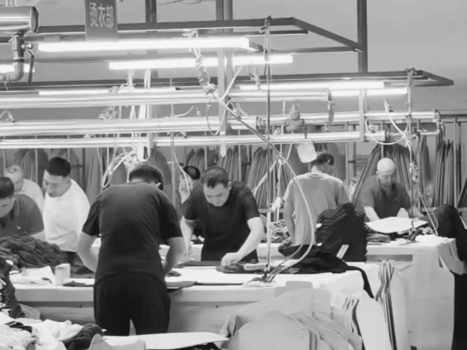 EtrenerKnit quality control team testing fabric for shrinkage and colorfastness before bulk knitting