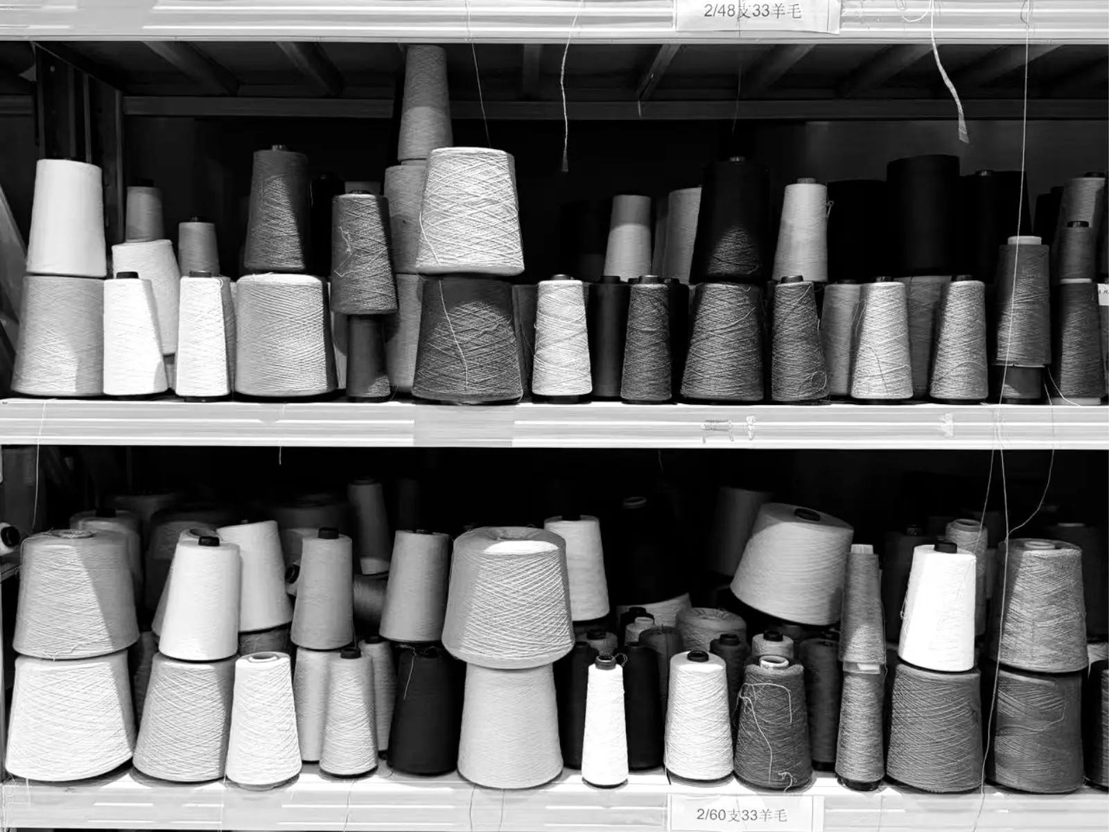Cones of merino, cashmere blend, cotton and recycled yarn tested for EtrenerKnit's knitwear collections