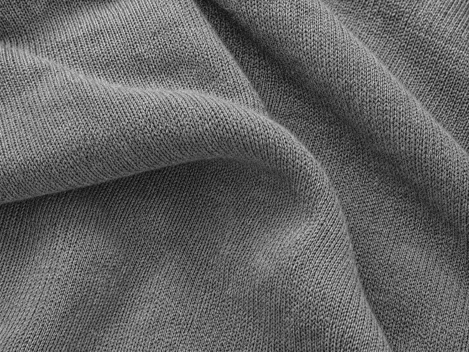Cones of merino, cashmere blend and cotton yarn in EtrenerKnit's material library